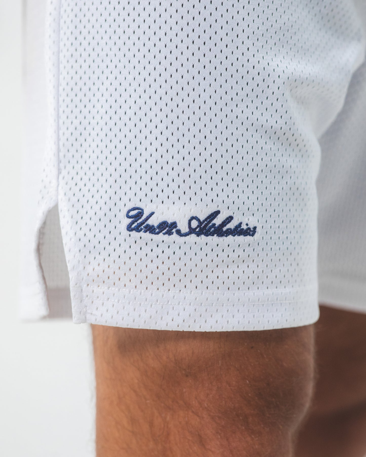 EMBROIDERED UN92 ATHLETICS MESH SHORTS
